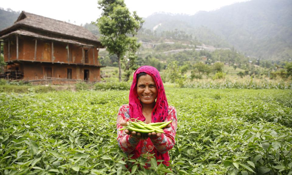 Woman farmer with produce