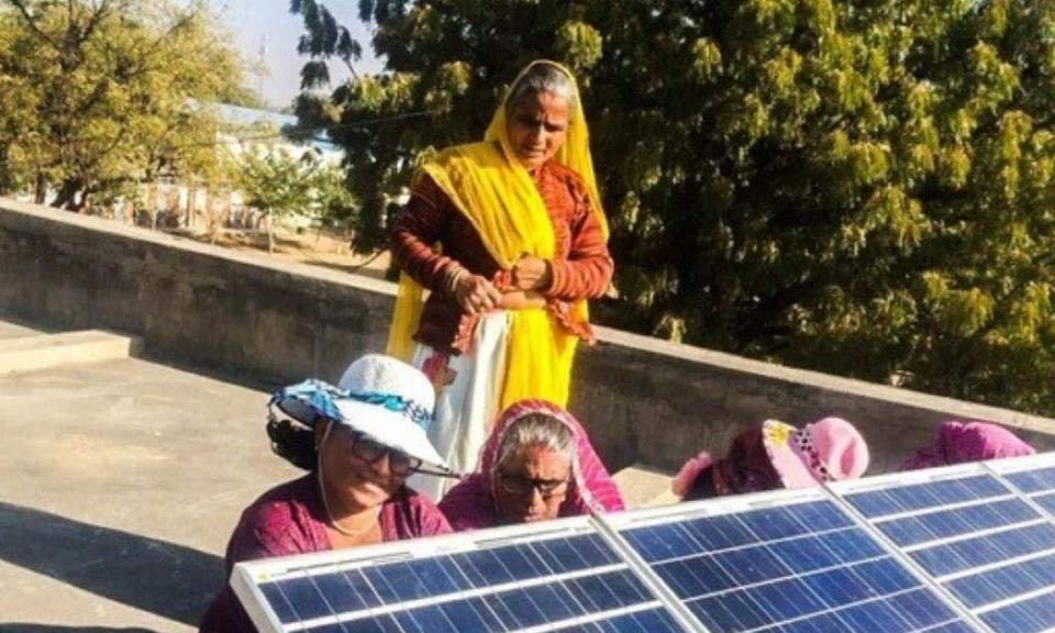 Women  with solar panels