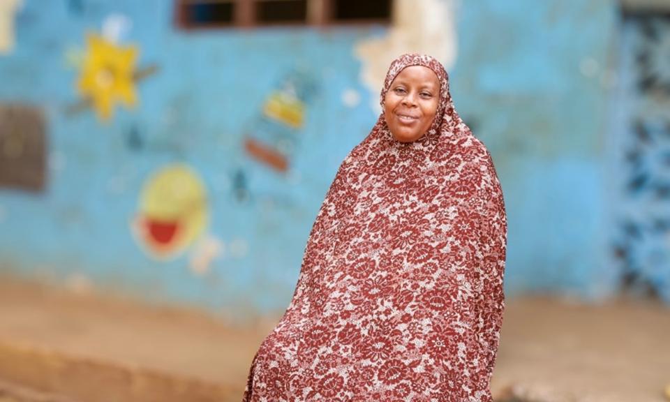 Munira Abdallah Abdallah in front of the childcare centre. Photo: UN Women