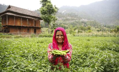 Woman farmer with produce