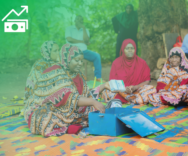Outcome 2: Income, decent work and economic autonomy. A woman farmer shows what she caries in her saving box. 
